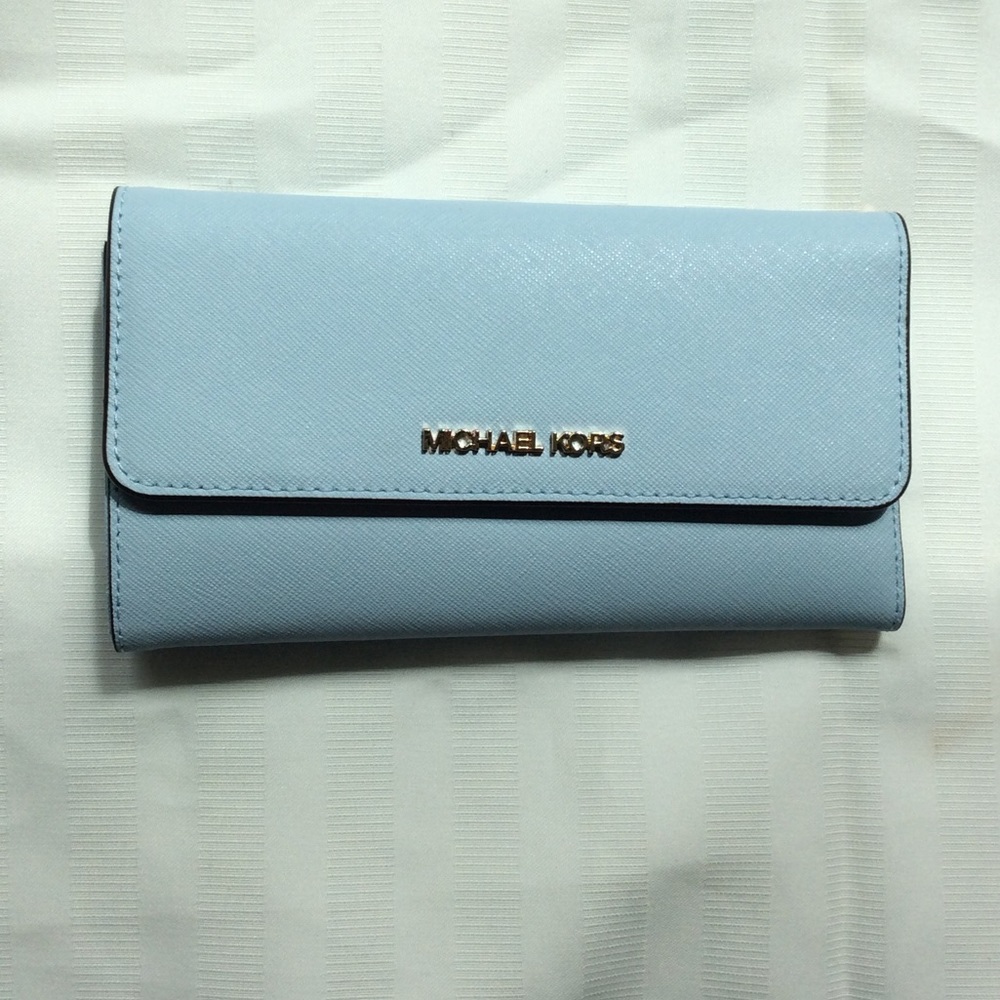 Blue Michael Kors woman’s wallet